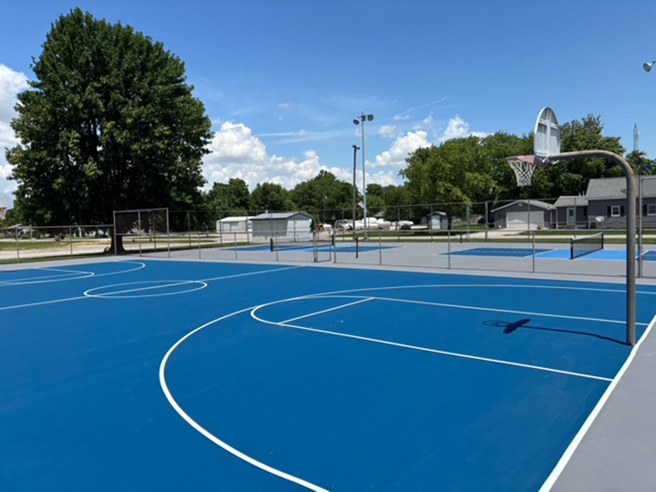 resurfaced blue outside basketball court